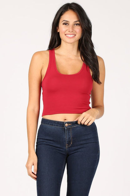 Racerback Tank Crop Top Sleeveless crop top with racerback and fitted bodice Model: 5'7" wearing size Small